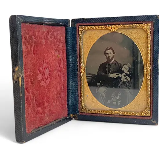 Gilt framed and leather cased ambrotype - bearded man and child,